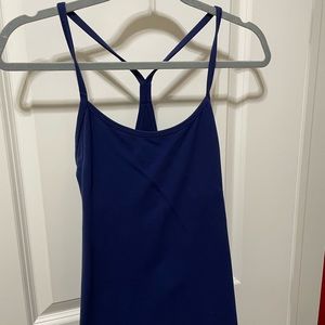 Navy Lululemon strappy tank. Built in bra, light support.